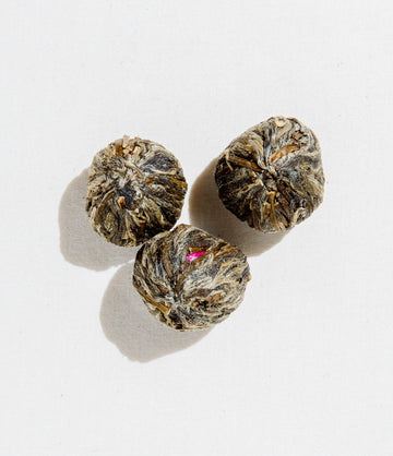 Halo Blooming Tea fully bloomed in glass – Art of Tea